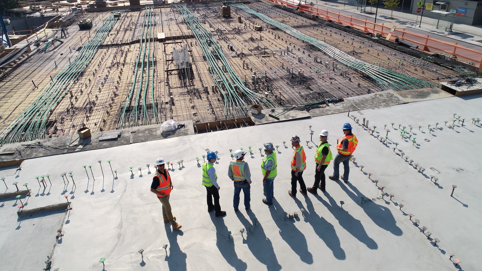 A construction crew inspects a construction site.