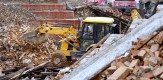 A JCB digger pictured at work on April 28th, 2015 in the earthquake disaster area in Kathmandu, Nepal