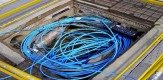 Fibre-optic_cable_in_a_Telstra_pit