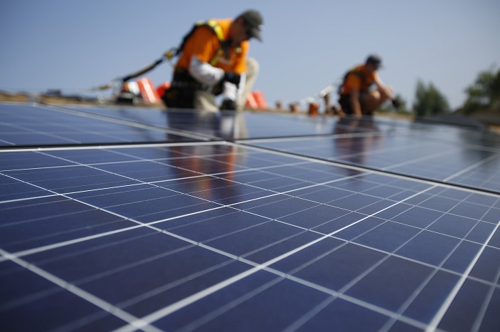 Installation of solar panels on a roof