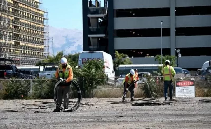 Construction workers prepare the site of the Santa Clara BART station for tunnel boring