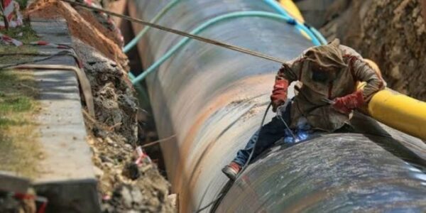 Man working on pipeline