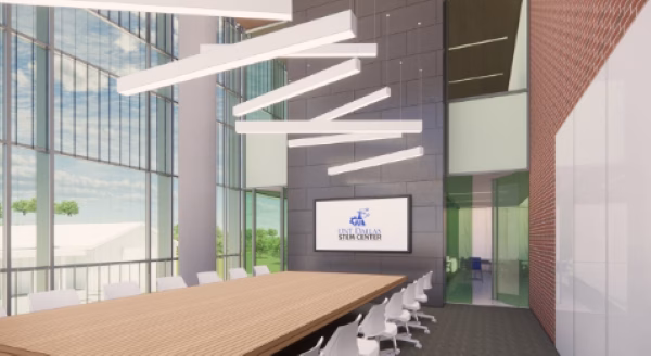 Rendering shows a glass enclosed conference room inspired by a STEM design element