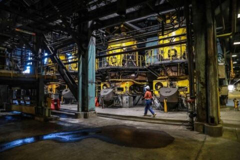 Technician inside Liddell coal-fired power station in Australia