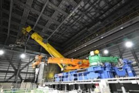 Fukushima Daiichi nuclear power plant starts unit 2 reactor fuel removal using a remotely operated crane system